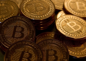 內地收緊購匯 比特幣比肩金價