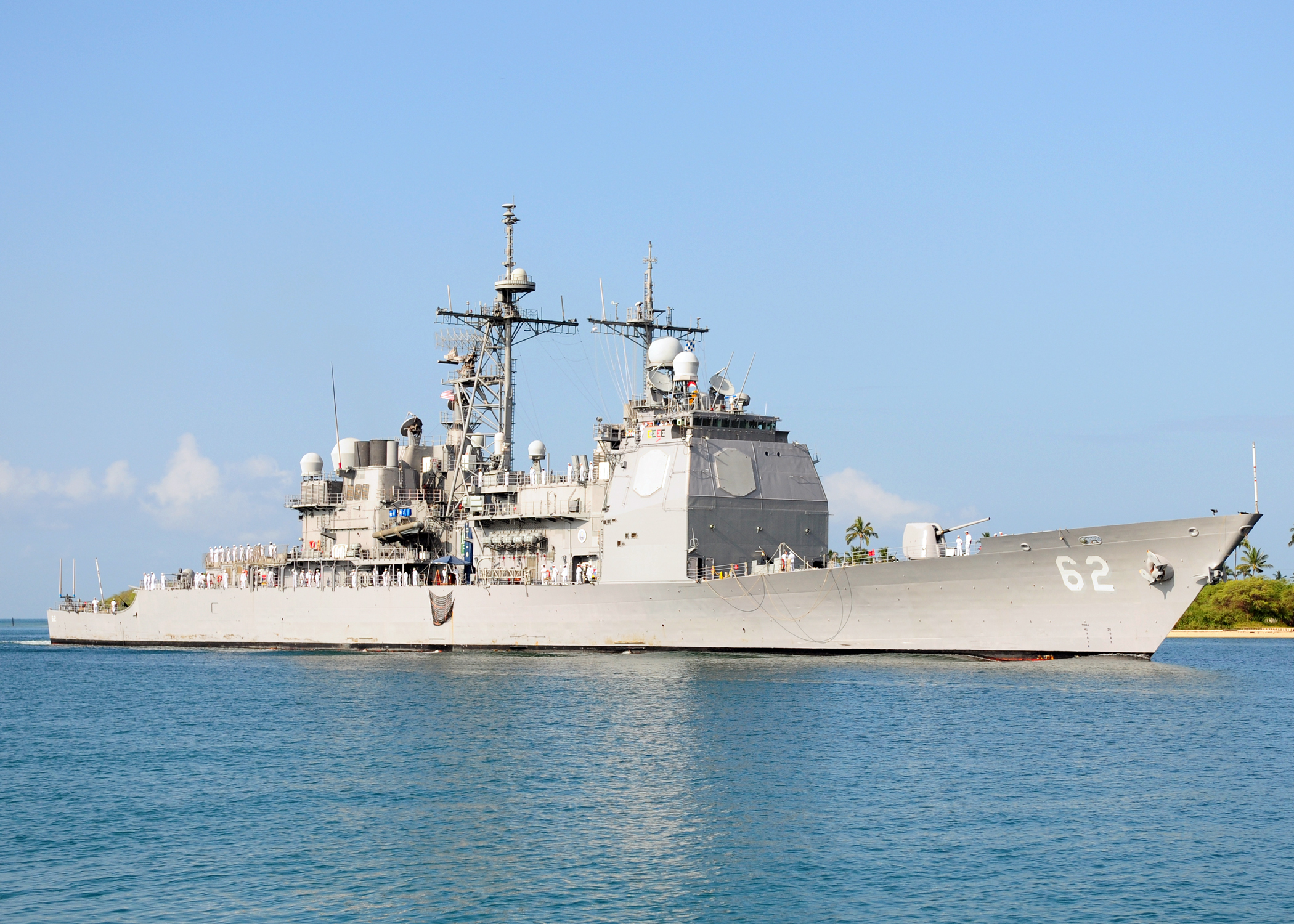 100628-N-6854D-001PEARL HARBOR (June 28, 2010) The Ticonderoga-class guided missile cruiser USS Chancellorsville (CG 62) arrives at Joint Base Pearl Harbor-Hickam to participate Rim of the Pacific (RIMPAC) 2010 exercises. RIMPAC is a biennial, multinational exercise designed to strengthen regional partnerships and improve multinational interoperability. (U.S. Navy photo by Mass Communication Specialist 2nd Class Jon Dasbach/Released)