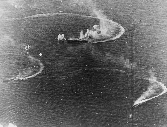 Japanese aircraft carrier Zuikaku and two destroyers under attack on 20 June 1944 80 G 238025
