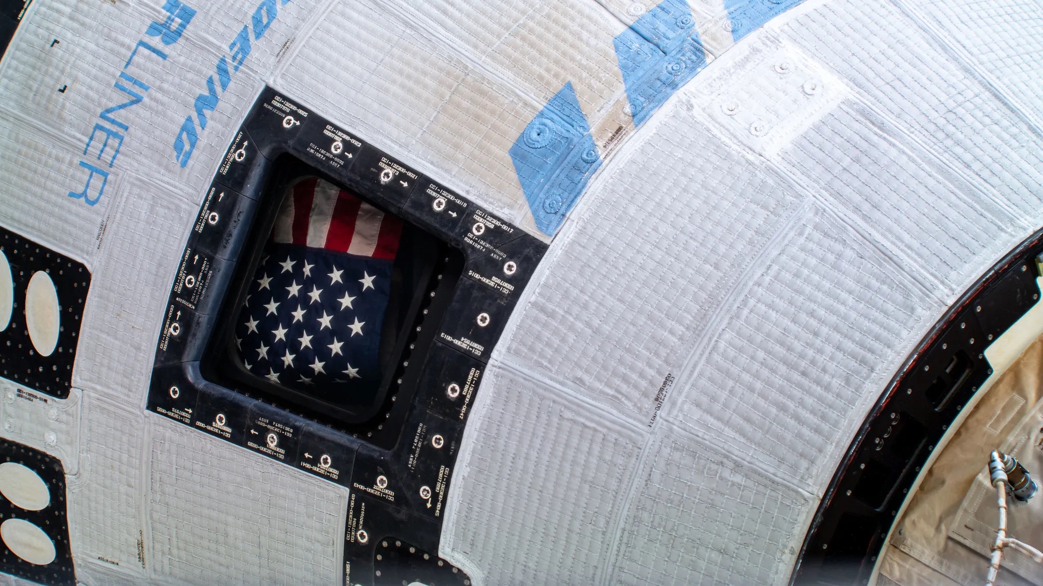 starliner with flag